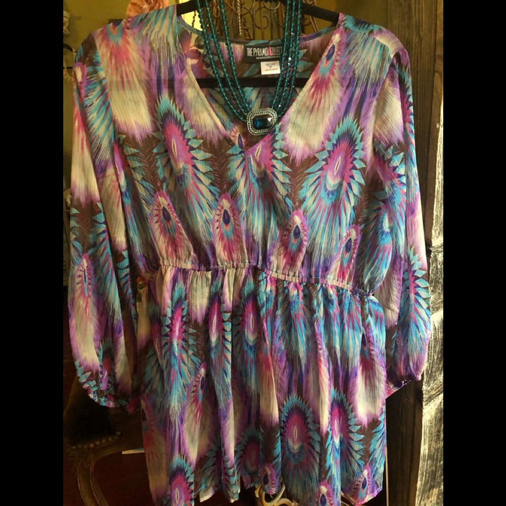 Sheer peacock blouse.